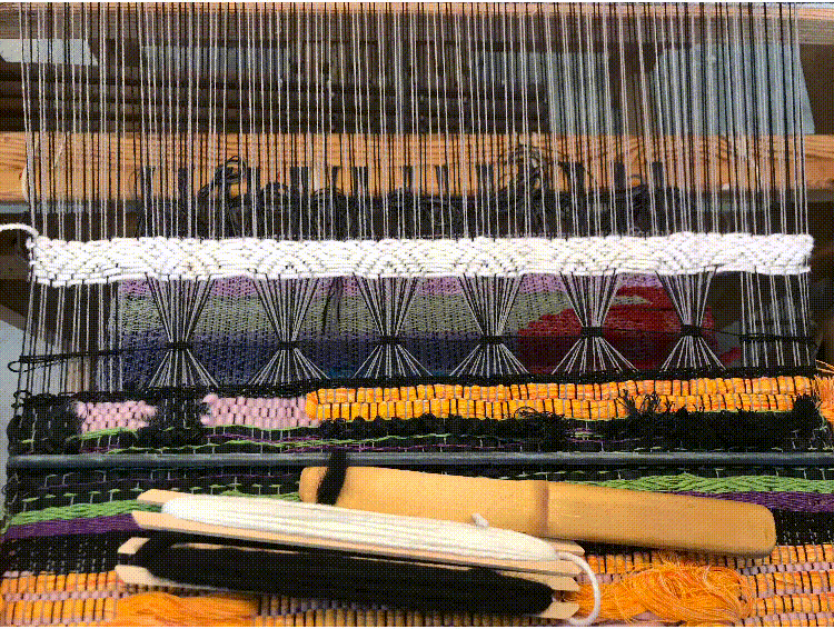 A gif put together from my photos of the weaving process.